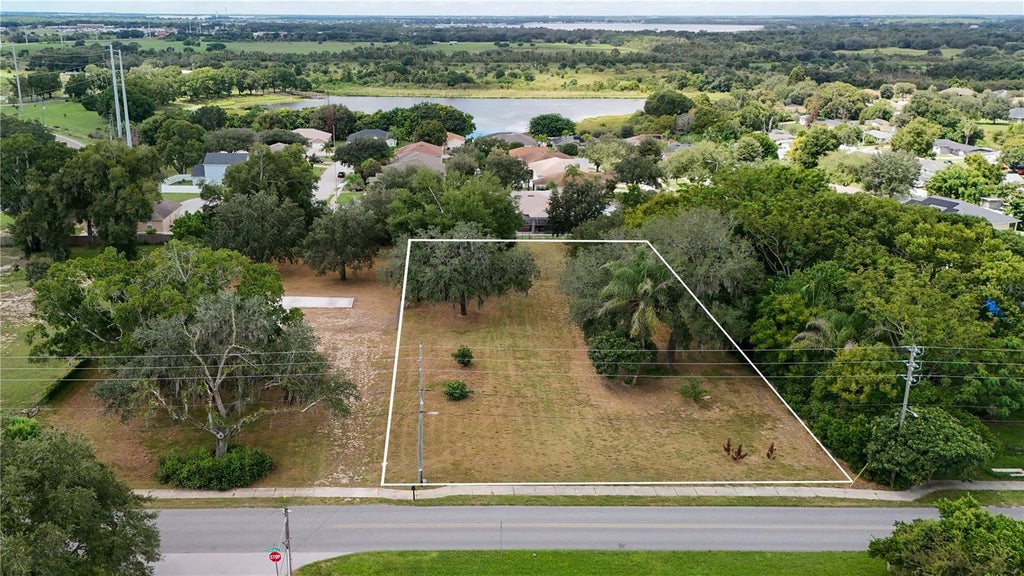 Photo of Peninsular Drive, Haines City, FL 33844 (MLS # L4965530)