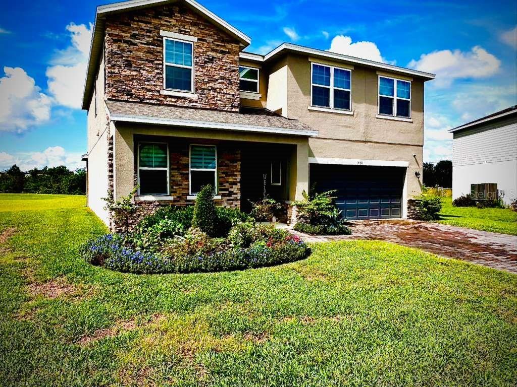 **MUST SEE*** 5/3 single-family home is the perfect combination of space and comfort for your growing family. With an impressive 2,856 square feet of living area across two levels, you can enjoy quality time together in style. The modern open floorplan connects the kitchen with an oversized island to a cozy family room where you can access the outdoor lanai to enjoy every sunset. Plenty of space to Build a pool with a perfect sunset view over the pond. There are plenty of spots reserved for working or relaxing - 1st floor has a Bedroom that can be used as a office room and 4 bedrooms upstairs provide ample restful havens too! The large primary suite offers dual vanities, a large walk-in closet, and standing shower - providing all the necessary amenities. This home design ensures everyone has their perfect place no matter what size family you have! Located near Lake Nona Medical City, Orlando International Airport, and top-rated schools, this home offers the perfect balance of tranquility and accessibility. Whether you're growing your family, relocating, or searching for more space, this home provides a rare opportunity to live with ease, comfort, and connection in one of Saint Cloud’s most desirable neighborhoods.