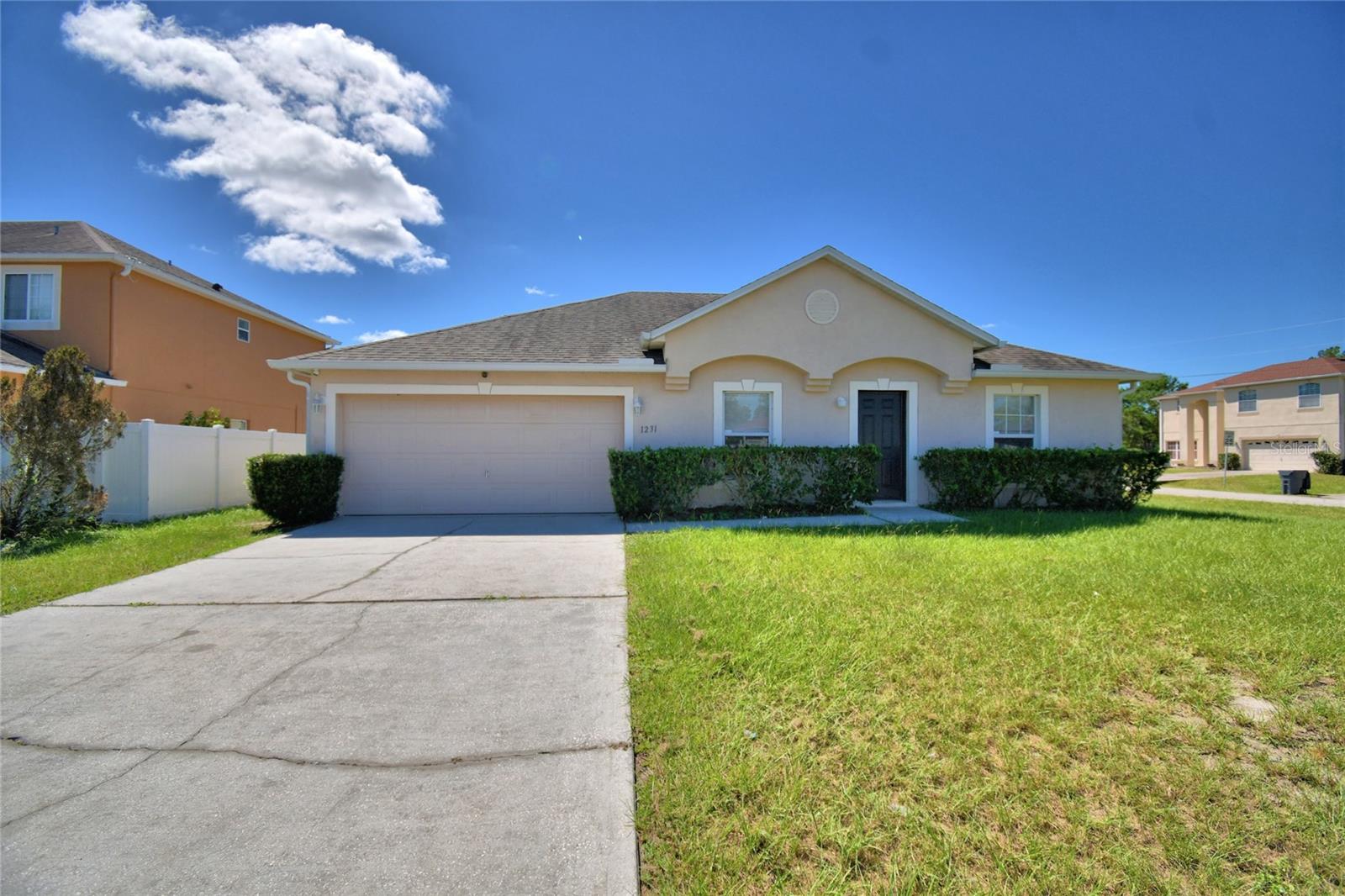 WELCOME TO 1231 APOPKA LANE!! IN THE HEART OF POINCIANA! HOME HAS BEEN KEPT IMMACULATE! OVERSIZED YARD AND SITUATED ON A CORNER LOT, THIS HOME IS LOCATED IN CENTRAL FLORIDA'S FASTEST GROWING AREA! 20 MINUTES TO DISNEY AND THEME PARKS, 30 MINUTES TO AIRPORT. LARGE KITCHEN FOR COOKING AND A DINETTE AREA....LIVING ROOM/DINING ROOM COMBO, SPACIOUS MASTER BEDROOM......HOME IS READY FOR MOVE IN! A MUST SEE CLOSE TO ORLANDO!!