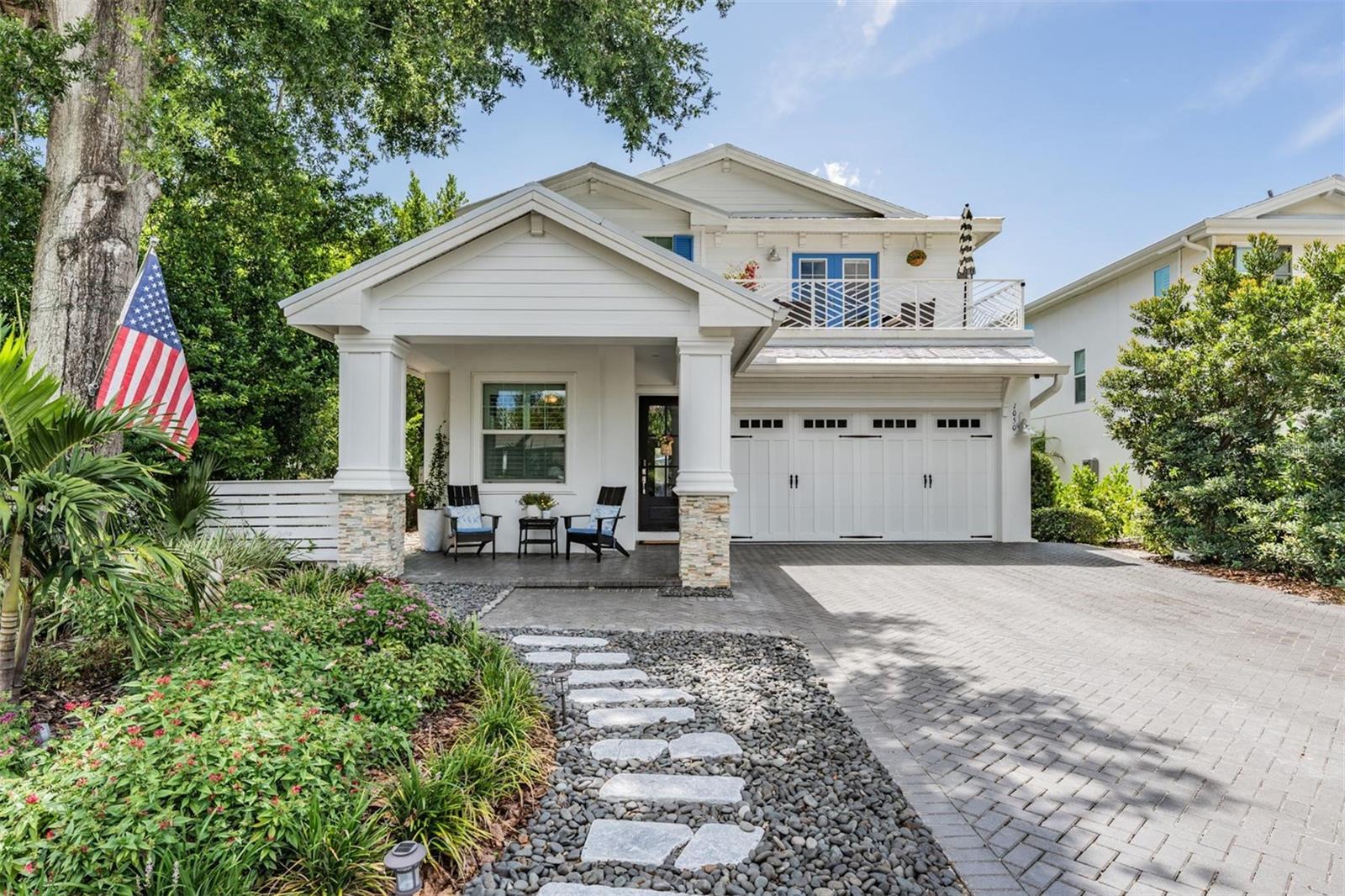 Located on a picturesque street of newer homes just off North Bayshore, this home puts you right in the heart of the Safety Harbor lifestyle. You’re just a 5-minute walk or golf cart ride to Main Street, where you can enjoy boutique shopping, local dining, and vibrant community events. Philippe Park — the oldest park in Pinellas County — is just around the corner, offering waterfront trails, picnic areas, and breathtaking sunsets. Safety Harbor is known for its small-town charm and big personality, hosting events like 3rd Friday celebrations, Chalk Fest, and festive parades. It’s no wonder USA TODAY’s 10Best ranked this quaint town among the nation’s best places to visit and live.
This beautifully designed home combines timeless charm with modern amenities, all in a prime Safety Harbor location. An inviting front entry, accented by stone pillars and a welcoming front porch, is complemented by a beautifully paved driveway that sets the tone for what’s inside.
Step through the light-filled entryway, where warm engineered wood floors, an elegant iron-railed staircase, and a graceful arched hall lead you to the heart of the home. Just off the foyer, a bright and airy room with plantation shutters offers the perfect space for a home office or sitting area.
The open-concept main living area features elegant tray ceilings, a cozy fireplace, abundant natural light, and seamless flow to the kitchen and outdoor living spaces—ideal for everyday comfort and entertaining. The bright, open kitchen boasts a large center island, crisp white cabinetry, quartz countertops, a spacious pantry, and a premium gas stove, with plenty of room for an eat-in dining space or cozy sitting area.
Just off the living room, a screened-in lanai provides a comfortable, shaded retreat and flows effortlessly to the private paver patio—perfect for outdoor dining and relaxation. The tropical backyard is lined with mature Areca Palms for added privacy and beauty. The first floor also offers a spacious bedroom with a private bathroom, plus a half bath with hookups for a washer and dryer.
Upstairs, a stylish hallway with custom wainscoting leads to a large bonus room that opens to a balcony with sweeping views of Tampa Bay. Enjoy water views from the bonus room, covered deck, and the spacious master suite, which features private balcony access, two walk-in closets, and a luxurious en-suite bath with a soaking tub, walk-in shower, and dual vanities. The private screened balcony is a serene retreat—perfect for morning coffee or unwinding in the evening. The second floor also includes two additional bedrooms, a large laundry room, and a full bathroom.
Notable features include: impact glass on all windows and doors, all-wood painted raised panel cabinetry, quartz kitchen countertops, a custom gas fireplace with painted brick surround, a Rinnai tankless water heater, decorative wood beams in the great room, decorative carriage-style insulated garage doors, stone columns, and more. The home is also pre-wired and structurally prepared for a future elevator. Best of all—it’s NOT in a flood zone!
Call today to schedule your private showing!