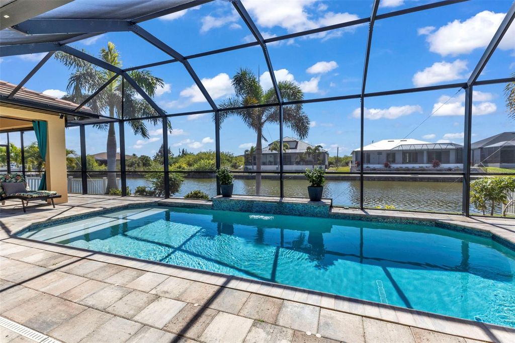 Photo of 15378 Taurus Circle, Port Charlotte, FL 33981 (MLS # C7522505)