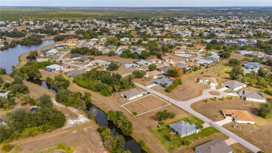 Build your Florida dream home on this cleared residential lot located on a freshwater canal with a greenbelt backdrop in the highly sought-after Deep Creek community of Punta Gorda. The homesite at 395 San Cristobal, Punta Gorda, FL 33983 offers a peaceful setting with scenic water and green space views, providing added privacy and a natural buffer.

Deep Creek features community sidewalks ideal for walking, a public golf course, neighborhood parks, tennis, pickleball, and basketball courts, along with nearby RV/boat storage, a public boat ramp, and coffee shops, restaurants, and shopping centers within the community. Located near Deep Creek Elementary School and local churches, the area offers everyday convenience and an active yet relaxed lifestyle that appeals to families, retirees, and seasonal residents alike. Just minutes away, downtown Punta Gorda provides boutique shopping, dining, waterfront activities, and access to a local marina.

This homesite is located in Flood Zone X, considered a very low-risk flood zone, where flood insurance is typically not required. Low HOA fees of just $210 annually per lot/home site and no CDD fees help keep ownership costs affordable. The HOA requires a minimum 2,000 square foot home.

Please note: the adjacent lot at 403 San Cristobal, Punta Gorda, FL 33983 is also available for purchase, offering the opportunity to combine both homesites for expanded building flexibility.

Conveniently located near shopping, dining, I-75, and Southwest Florida’s beaches, this lot offers an excellent opportunity to enjoy the relaxed Florida lifestyle.