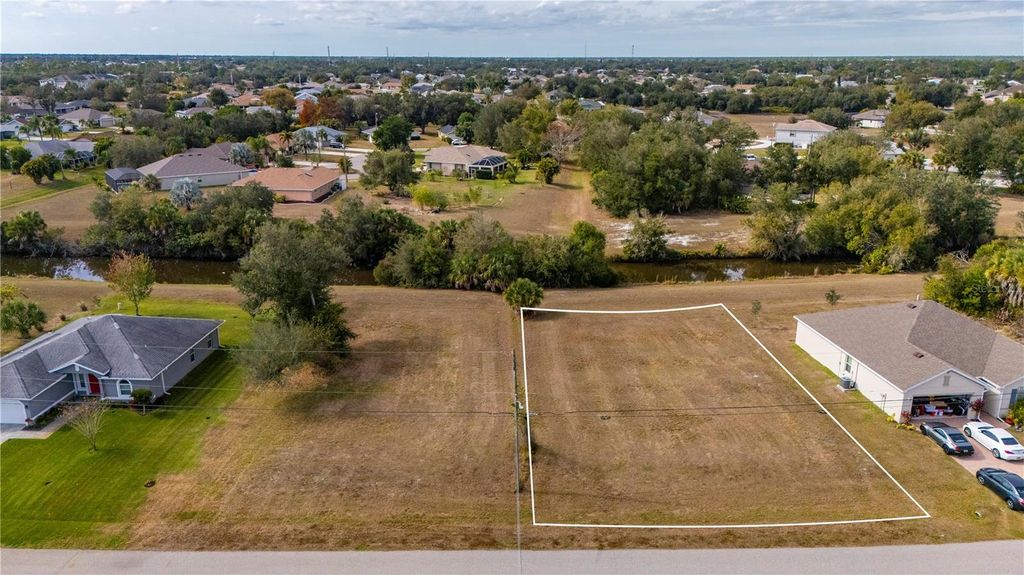 Photo of 395 San Cristobal Avenue, Punta Gorda, FL 33983 (MLS # C7520231)