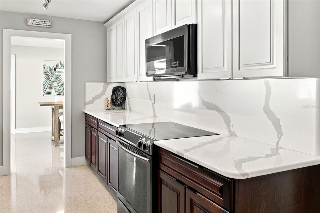 Photo of 4523 Clearwater Harbor Drive S, Largo, FL 33770 (MLS # TB8346318)