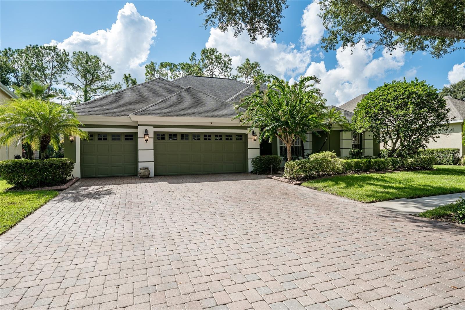 Welcome to the luxurious River Hills Country Club golf community! Upon entering the 24-hour guard-attended security gate, your sights turn to the majestic oaks lining the streets and meticulous landscaping that make this community so inviting. This jewel property sits in the much-desired St Andrews neighborhood known for its family vibe and year round holiday festivities. The 4 bedroom plus den/office home has 3 fully updated baths and a 3-car garage. As you enter, you are greeted with high ceilings, beautiful wood floors, and French doors leading to the screened lanai and heated pool area with private views of the golf course and trees directly behind the house. The split floorplan boasts a master ensuite with French doors, lovely pool views, large walk-in closet, 2 additional closets, and a large bathroom OASIS that must be seen to fully appreciate. Adjacent to the master ensuite is the office/den with custom French doors which also could be used as a “5th bedroom.” In the kitchen you will find stainless steel appliances, granite countertops, bar seating, an island prep area, soft close cabinets, and a large pantry. A separate laundry room with custom overflow pantry, sink, and additional storage simplifies daily life. The open floor plan with eat-in kitchen and separate dining, living, and TV areas provide ample entertainment space. The primary guest bedroom boasts a walk-in closet and built-in bookshelves and is adjacent to the guest bathroom with a pool entrance so wet feet won’t damage that gorgeous wood flooring. The additional bedrooms also have walk-in closets and are connected by a custom Jack and Jill bathroom. House was freshly painted in 2023 and the owner has records of the many updates and customizations completed. If the power goes out, you have a Generac/Honda generator system on hand to keep critical areas running. HOA dues include a social membership to the River Hills Country Club, providing access to events, dining, and social club amenities. The River Hills Country Club also offers amenities including an 18-hole golf course, driving range, chipping and putting practice areas, pool, tennis courts, pickleball courts, clubhouse, restaurant, playgrounds, basketball court, nature trails and more! So many more details about this home so please call for more information or to set up a showing.