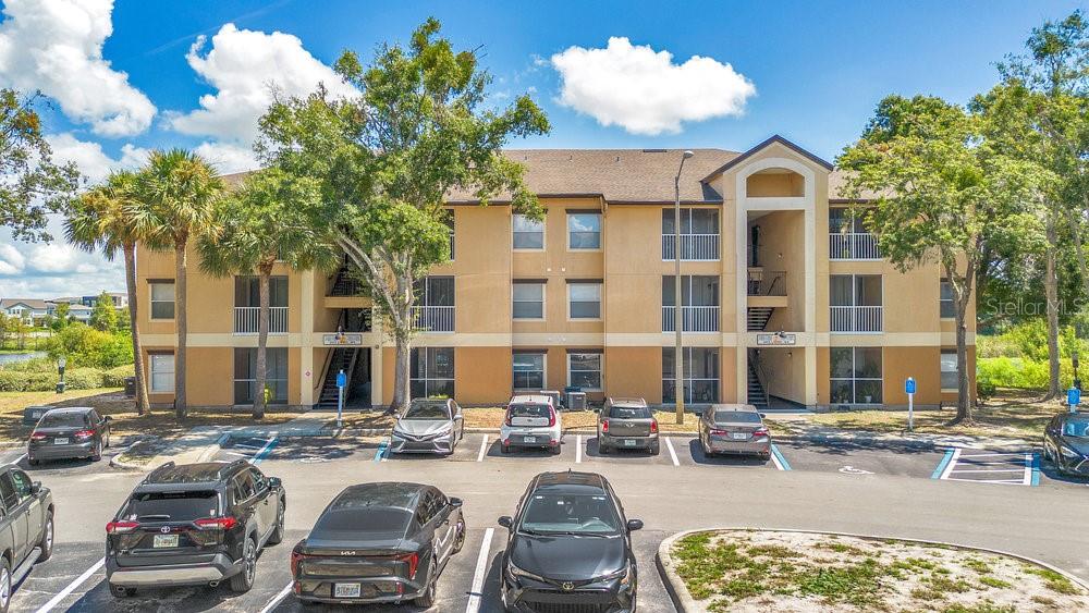 One or more photo(s) has been virtually staged. Welcome to this incredible investment opportunity in the highly desirable Sand Lake Private Residences in Dr. Phillips. This spacious one-bedroom, one-bath condo offers a bright, open and functional layout. The primary bedroom includes a large walk-in closet, the living/dining room combo offers flexibility to accommodate an office or just comfortable living space. The laundry room is spacious and allows for shelving and storage. The screened-in balcony offers a cozy outdoor space and includes an additional storage room. Sand Lake Private Residences is a gated community that attracts long-term residents and renters alike, thanks to its resort-style amenities which include a beautiful pool, fitness center, and clubhouse—set among lush landscaping and scenic lake views. Located just minutes from Orlando’s Restaurant Row, shopping, major highways, and world-famous attractions, this property offers strong rental potential and consistent demand. Whether you’re expanding your portfolio or searching for a low-maintenance primary home, this condo delivers both value and location. Call for additional information and to schedule your showing today.