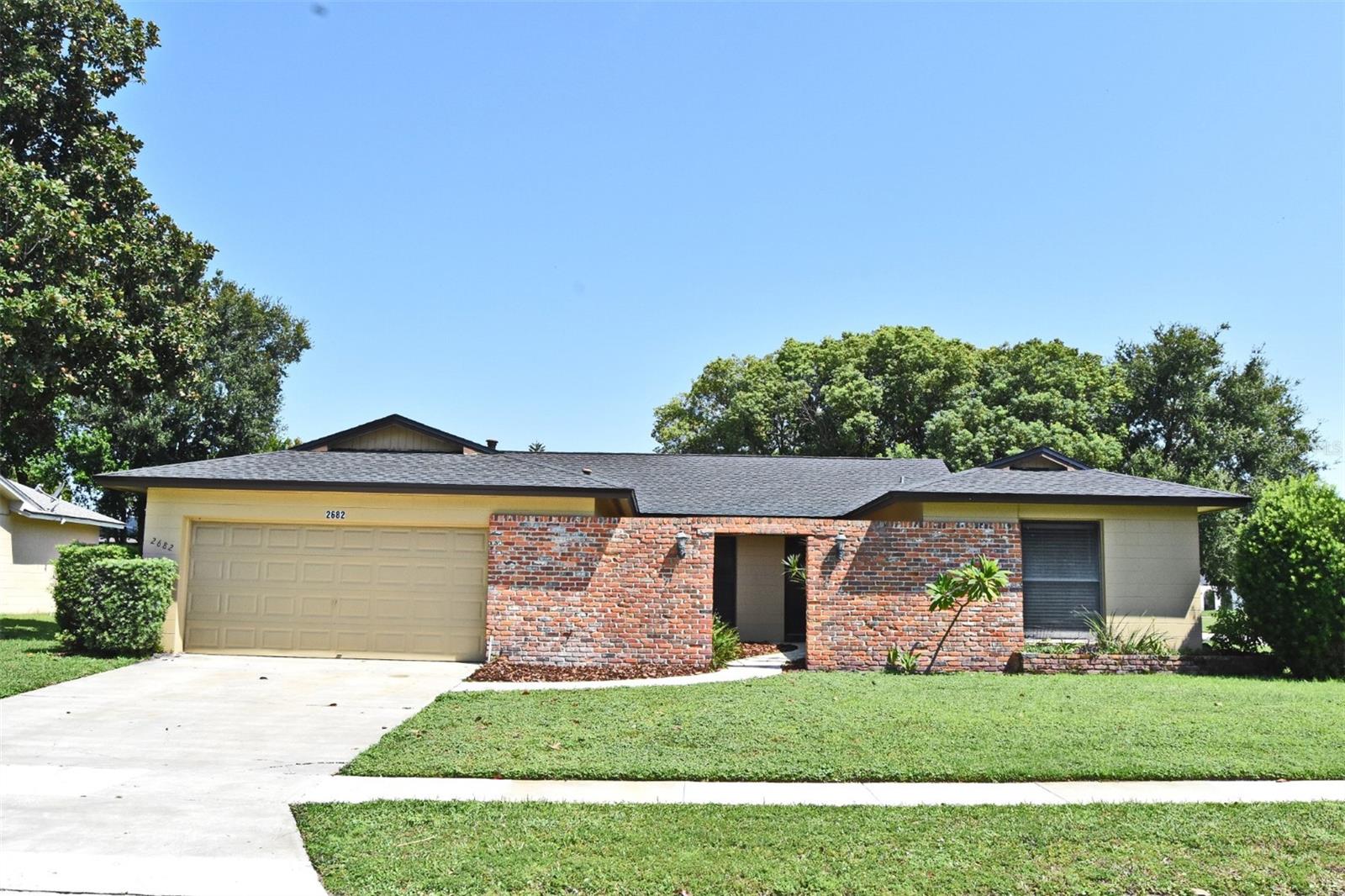 Charming & Recently Updated 4-Bed / 2-Bath Rental in Winter Park: Welcome to 2682 Tierra Circle, a tasteful and modernized rental situated in the well-known area of Winter Park. This single-story home offers approximately 1,874 square feet of living space, showcasing fresh interior, brand-new flooring, and an intelligently laid-out split floor plan that enhances both privacy and versatility. The bright and airy living/dining area opens into a separate family room—ideal for entertaining or simply relaxing. All appliances are included (dishwasher, range, refrigerator, washer/dryer, microwave, garbage disposal), ensuring effortless move-in and daily convenience. The master suite is clearly delineated from the other three bedrooms, featuring dual closets. The sizeable, fenced backyard is low maintenance and perfect for pets, gardening, or outdoor downtime—with lawn care included in the lease. A Two Car attached garage, central heating and cooling, and the highly favorable Winter Park location—close to shopping, dining, schools, and green spaces—round out this exceptional rental opportunity. Don’t miss your chance to live in comfort, style, and convenience—book your showing today!