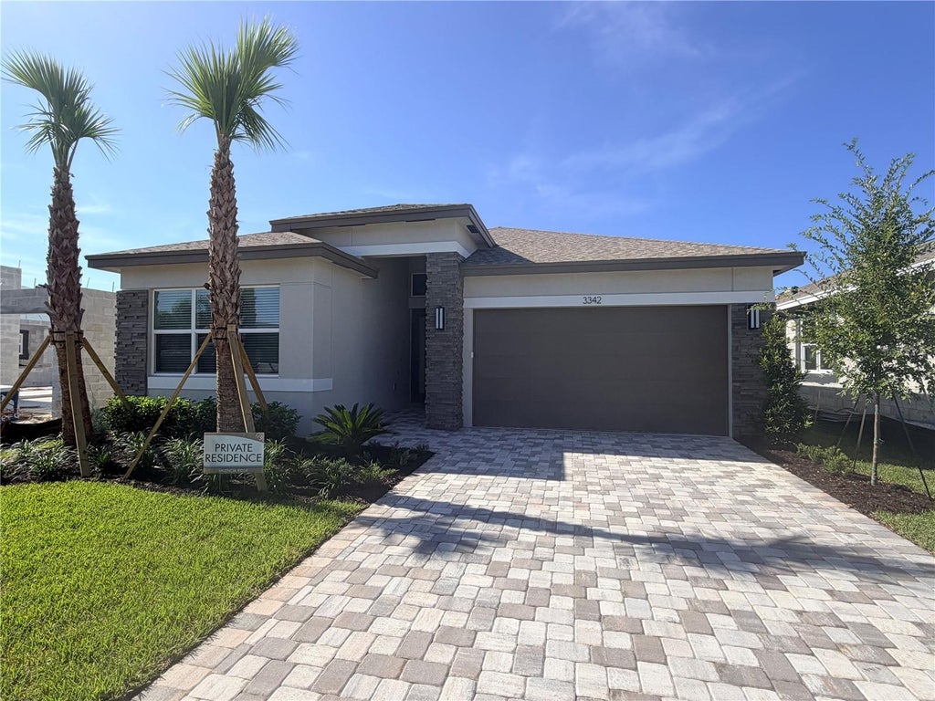 Photo of 3342 Malta Avenue, Wesley Chapel, FL 33543 (MLS # J1004106)