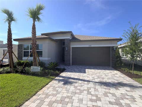 Photo of 3342 Malta Avenue, Wesley Chapel, FL 33543 (MLS # J1004106)