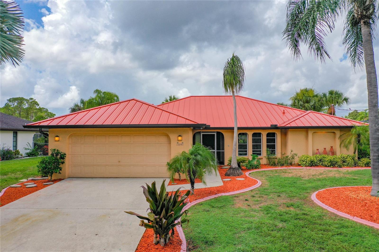 Port Charlotte Waterfront Pool Home – Prime Location! This spacious 3-bedroom, 2-bathroom home with a 2-car garage offers 1,725 square feet of comfortable living space and is perfectly situated for enjoying the Florida lifestyle. The property features a private swimming pool with a screened pool cage, a bar area, and a sundeck for relaxing or entertaining. Enjoy direct water access from your own boat dock (currently undergoing repairs), along with a small private beach area for added enjoyment. Inside, you'll find an updated kitchen and a desirable split floor plan that maximizes privacy and functionality. Pool care is included for your convenience. As a bonus, a portion of the tenant’s monthly payment will go toward the Utility & Maintenance Reduction Program, which provides HVAC filters delivered to your home approximately every 30 days—helping to reduce heating and cooling costs by 5–15% and promoting a clean, healthy living environment.
**Please note...dock is in the process of being repaired.