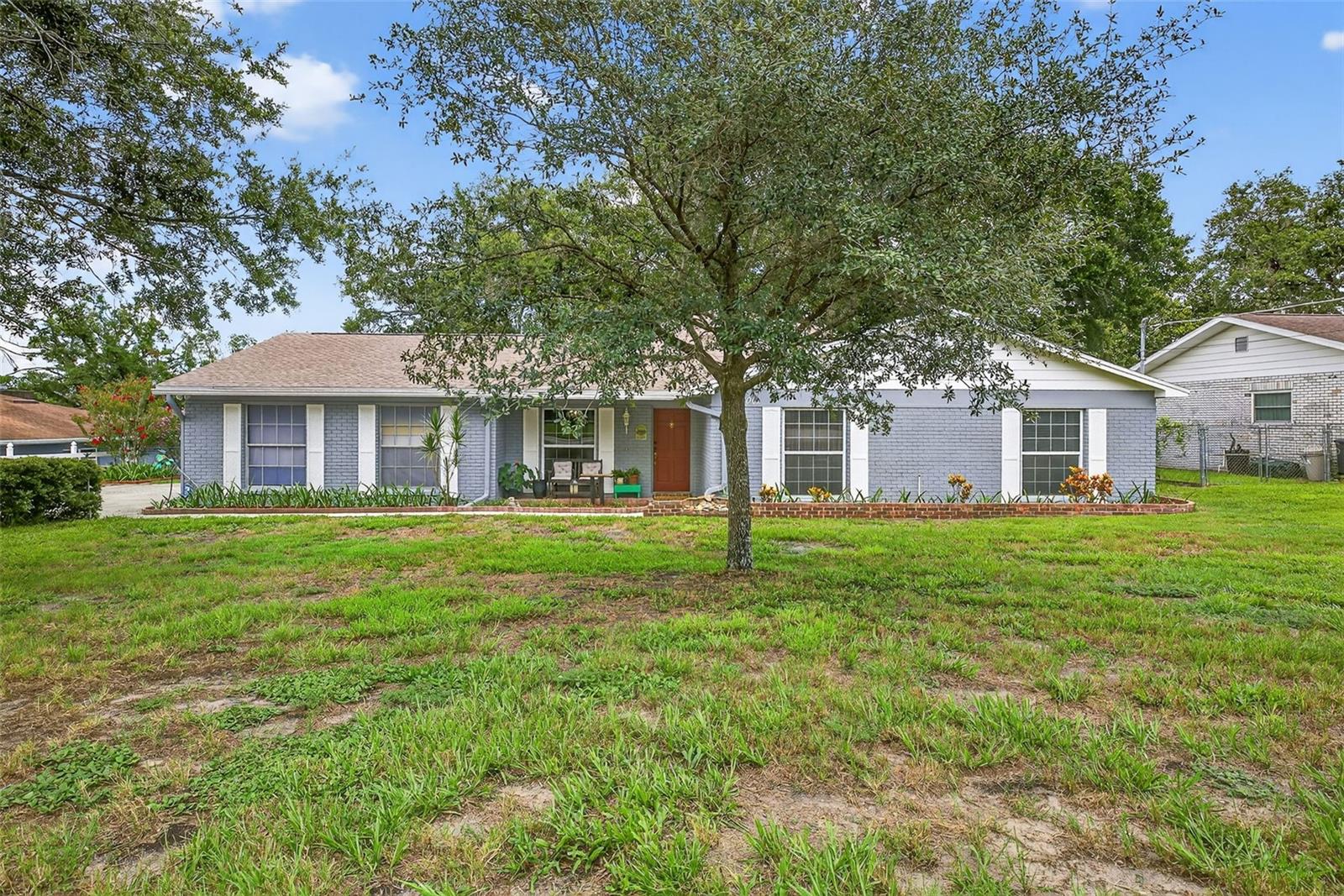 Welcome to this move-in ready 3-bedroom, 2.5-bathroom home with a dedicated office or optional 4th bedroom, located in the heart of TEMPLE TERRACE—one of Tampa Bay’s most beloved communities known for its tree-lined streets, charming character, and warm neighborhood feel. This home willl give you peace of mind with its brand NEW ROOF in 2025, AC in 2024 and all appliances in great condition.
Upon entry, you're greeted by a large front dining room that could easily function as a second family room or flex space, depending on your lifestyle needs. The heart of the home is the well-equipped kitchen, boasting rich wood cabinetry with abundant storage space, sleek Corian countertops, and a practical layout that opens into the adjacent formal dining room and large living room—perfect for intimate gatherings or daily relaxation. From here, step into the expansive enclosed patio, a bonus indoor-outdoor living space that can be used year-round for lounging, entertaining, or even a home gym.
The primary suite features a private en-suite bath and ample closet space. Two additional bedrooms are well-sized and share a full bath, while the half bath is ideally located for guests. A separate office/den provides the flexibility to serve as a 4th bedroom, study, or craft room.
Step outside into your fully fenced, oversized backyard—a rare find with room to roam, garden, or add a pool. The 3/4 ACRE PROPERTY includes both an attached 2-car garage and a detached 1-car garage/workshop at the back, offering extra storage, work-from-home possibilities, or future guest suite potential.
Nestled in a peaceful, established part of Temple Terrace with no HOA, this home offers the best of both worlds—quiet residential living with quick access to I-75, USF, the VA & Moffitt hospitals, Busch Gardens, golf courses, and great local dining. Temple Terrace is known for its strong community feel, parks, and recreation facilities, making it one of the best-kept secrets in the Tampa Bay area.
Don't miss your chance to own a charming home on a large lot in a truly desirable location. Schedule your private tour today!