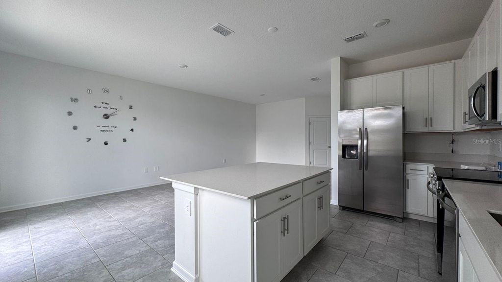 Photo of 3207 Laurent Loop, Davenport, FL 33837 (MLS # O6352232)