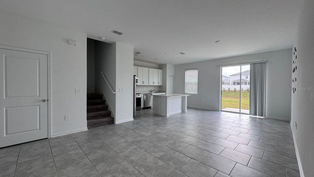 Photo of 3207 Laurent Loop, Davenport, FL 33837 (MLS # O6352232)