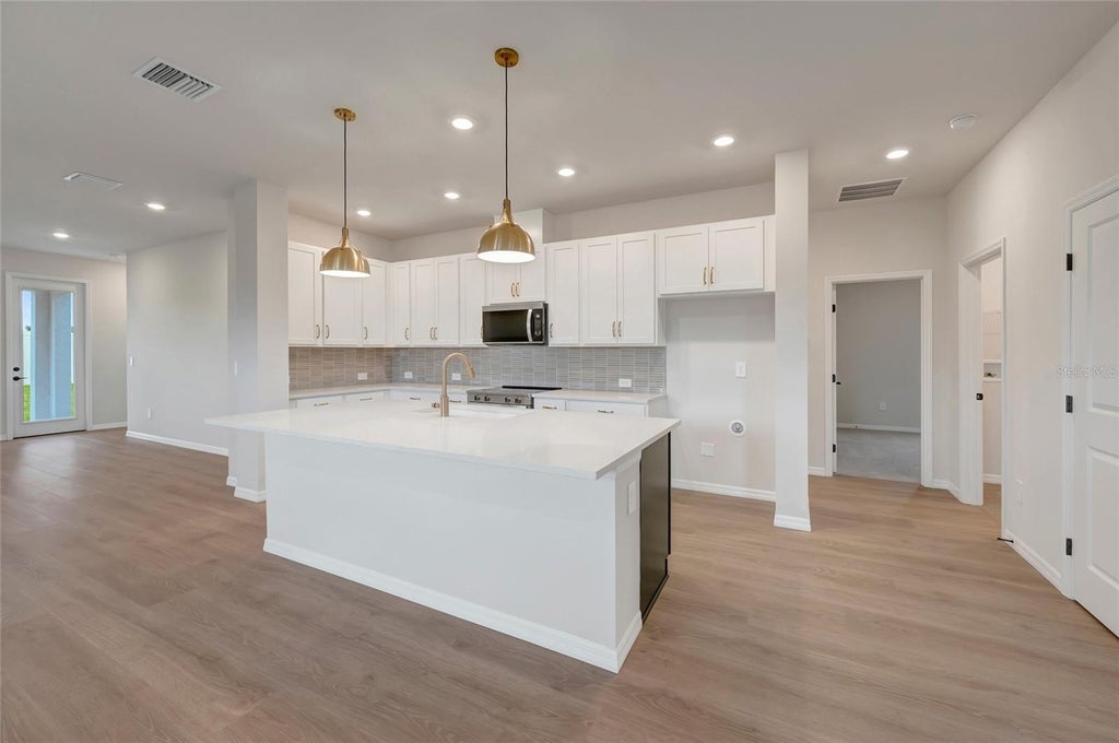 Photo of 3712 Jons Lakeview Street, Plant City, FL 33566 (MLS # TB8524188)