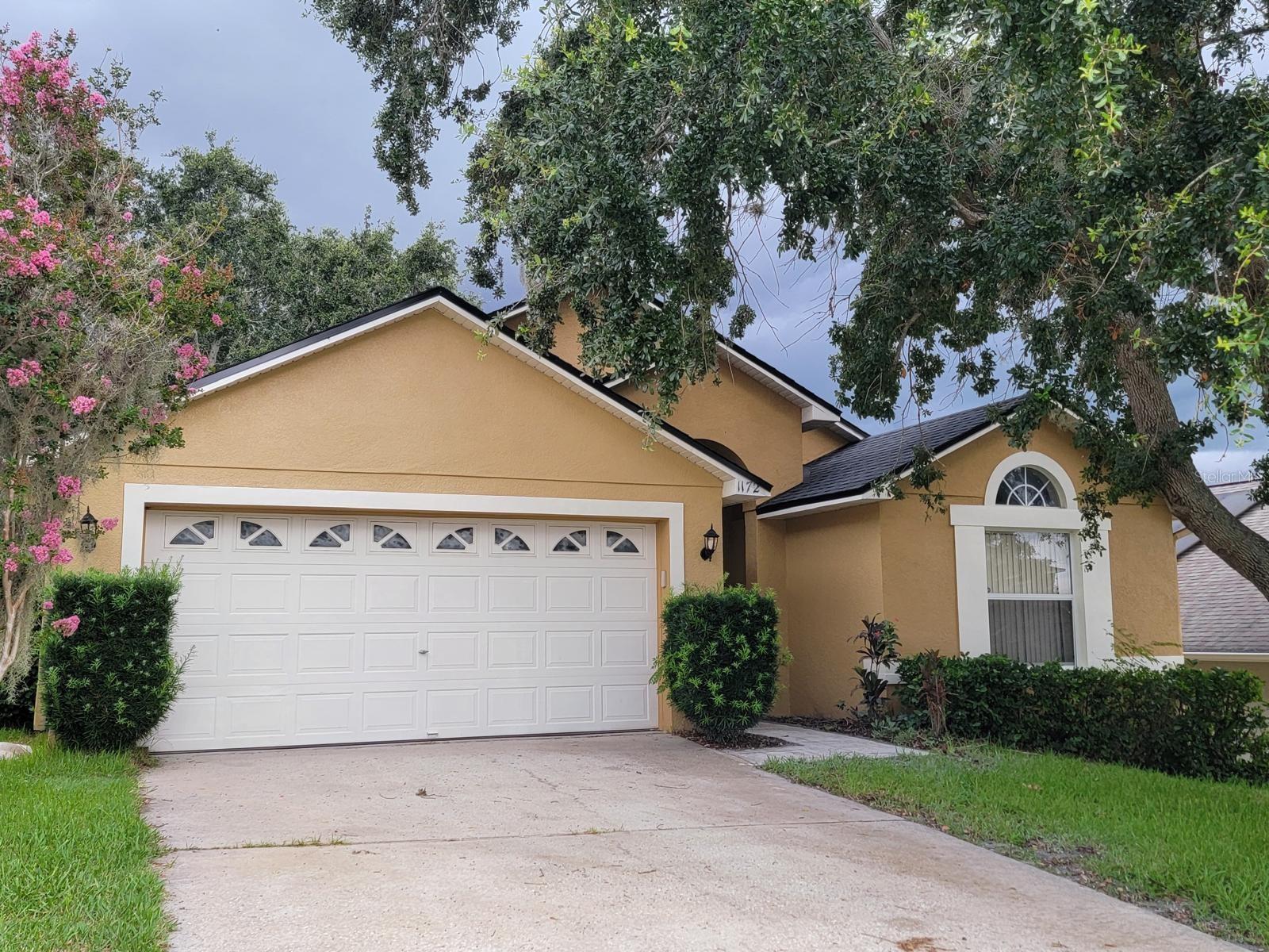 Welcome to this freshly updated 4-bedroom, 2-bathroom home nestled in the rolling hills of Clermont/Groveland area. Next to the Green Valley Golf Community, this spacious home features an inviting open floor plan with vaulted ceilings and new durable vinyl flooring, creating a bright and airy atmosphere ideal for both relaxing and entertaining. The interior has been freshly painted, and the home boasts a fairly new roof and A/C unit, offering peace of mind for years to come. Enjoy quiet evenings or morning coffee on the screened-in back porch.
The community is adjoining a scenic golf course and residents can also enjoy access to fantastic community amenities including an outdoor pool and a playground. The home is conveniently situated near top-rated schools, shopping centers, major highways, the local hospital, and provides easy access to Orlando and the surrounding areas.This is a great spot if you’re looking for space, convenience, and a welcoming neighborhood. Reach out today to schedule a tour!