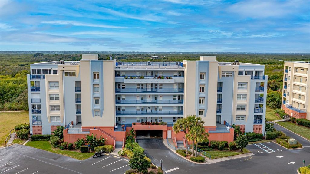 Photo of 5300 S Atlantic Avenue #5-405, New Smyrna Beach, FL 32169 (MLS # O6381832)