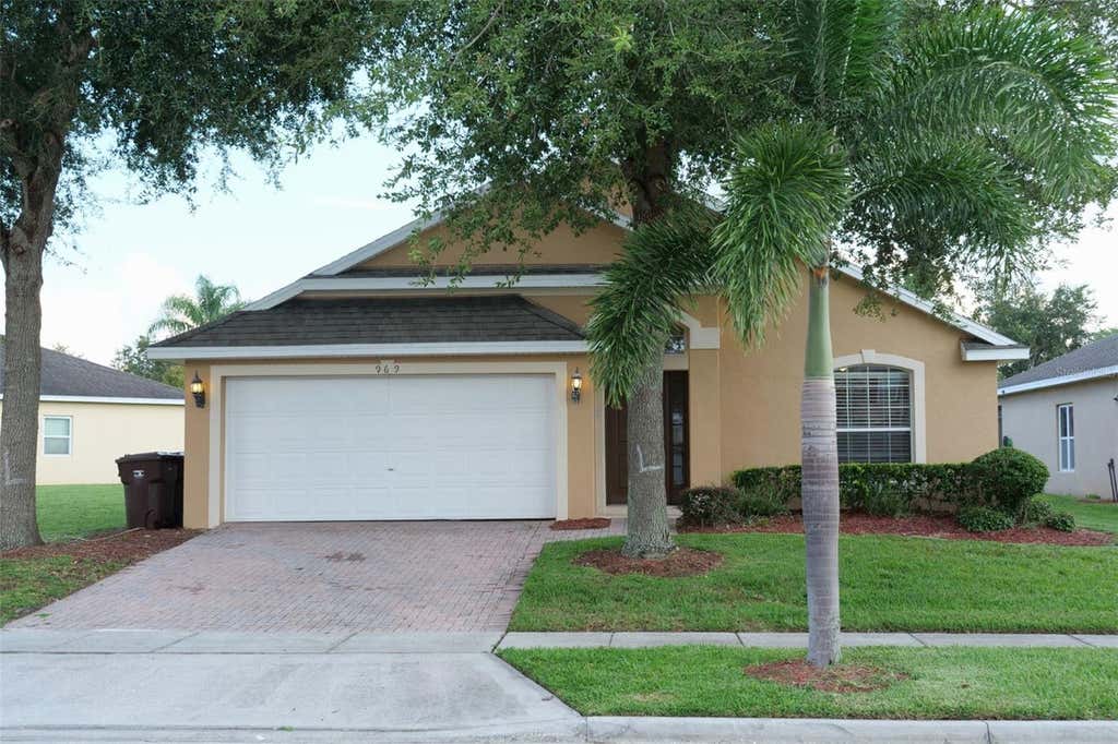 Photo of 969 Andalusia Loop, Davenport, FL 33837 (MLS # O6432459)