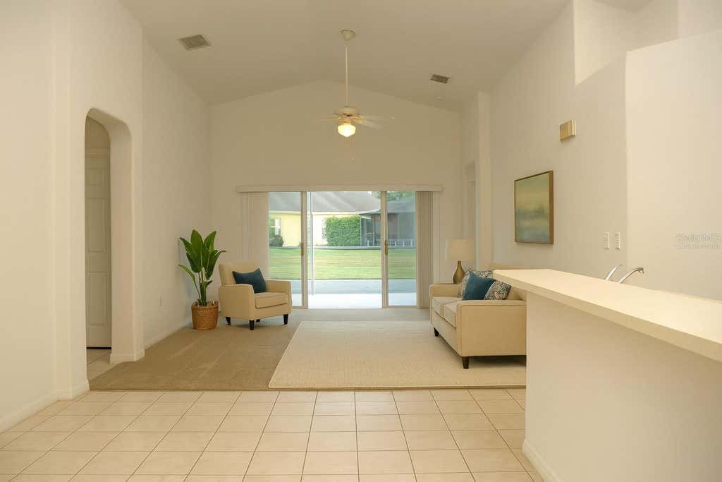Photo of 969 Andalusia Loop, Davenport, FL 33837 (MLS # O6432459)