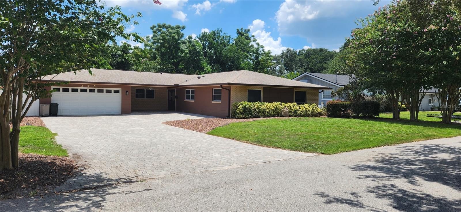 This residence exemplifies pride of ownership, boasting a beautifully appointed kitchen with high-quality, updated cabinetry and granite countertops, complemented by upper-end stainless steel appliances. Upon arrival, the exceptional workmanship evident in the pavers driveway is immediately apparent, and this attention to detail extends to the nicely landscaped backyard, complete with a paver patio. The roof was installed in September 2020. Prospective buyers may be interested in assuming the seller's 2.76% interest rate. Please note that the sellers are currently in the process of vacating the property, a few large items remain.
