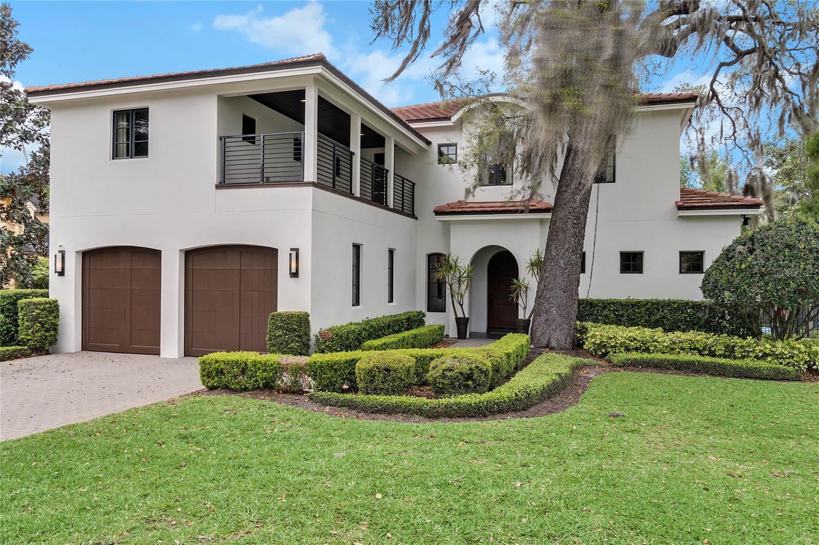 "The richness of an artist is the fusion of influences that have shaped his life and work", ~ Fernando Botero. WELCOME HOME to 2550 Venetian Way, located in the historic and renowned city of Winter Park, accessing the Maitland/Winter Park CHAIN OF LAKES! This custom modern/contemporary 2008 build, derives it's over 4800 sq/ft of essence and uniqueness by fusing vibrant colors and eloquence with high-end home features and artistic details. Upon entry, visitors are greeted by a gorgeous rotunda accented with stained glass panels and vaulted, recessed ceilings. With 4 bedrooms, 3 full baths, and 2 half baths, this split plan is anchored on the first floor by the oversized owner's suite complete with walk-in closets, steam shower with dual stations and multi shower heads, jacuzzi tub, separate vanities and bidet. Make your way through the spacious living and dining areas while continuing on to the gourmet/chefs kitchen equipped with state-of-the-art appliances including Thermador refrigerator, Thermador gas range and double oven, hidden walk-in pantry, a large working island, multiple food prep zones, wine fridge, and bar height seating areas. Lounge with family and friends while entertaining via the great room generously apportioned with floor to ceiling views of the back patio, water front, and canal leading out to Lake Maitland. Meander upstairs via the winding staircase where you will find 3 additional bedrooms, 2 full baths, and 2 loft spaces ideally set for gaming and leisure complete with a wet bar, all centralized around the stunning scopes of the rotunda. Move adjacent and enter the large media room complete with home theater, and an additional flex space perfectly situated for a gym/workout room, playroom, office space, or additional large bedroom. Host formal or informal gatherings on the backyard porch and vast paver patio. Use the private boat dock to store the boat of your choice complete with remote operated boat lift and boat lift cover. Relax while cruising through the canal then head out to Lake Maitland for all of your boating and water recreational activities. Take a trip out to Dog Island and relish the views of the Isle of Sicily. Enjoy morning coffees and/or your favorite evening beverage at sundown utilizing either of two second floor balconies. Bike, walk, or run the local trails, public sidewalks, and paths. Venture to downtown Park Avenue for fine dining and upscale shopping. Or visit Maitland's local eateries and green spaces. Easy access to the Winter Park Racquet Club, and Kraft Azalea Gardens via Lake Maitland. Zoned for top-rated OCPS Schools; Dommerich Elementary, Maitland Middle School, and Winter Park High School. All of the latest styles, vibrant colors, and unparalleled designs will be part of your everyday life! Relaxation and a renewed sense of self await!