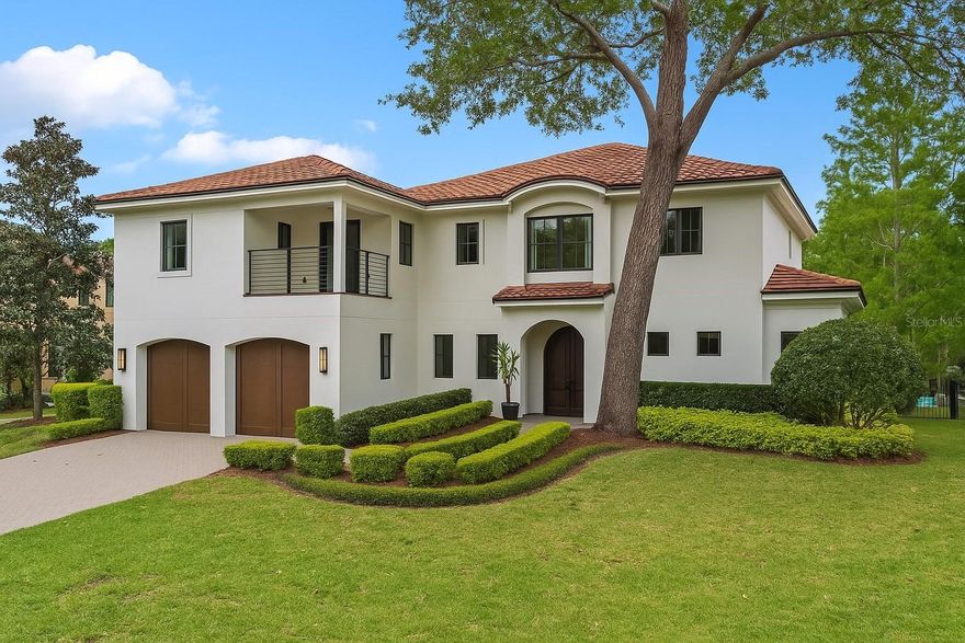 "The richness of an artist is the fusion of influences that have shaped his life and work", ~ Fernando Botero. WELCOME HOME to 2550 Venetian Way, located in the historic and renowned city of Winter Park, accessing the Maitland/Winter Park CHAIN OF LAKES! This custom modern/contemporary 2008 build, derives it's over 4800 sq/ft of essence and uniqueness by fusing vibrant colors and eloquence with high-end home features and artistic details. Upon entry, visitors are greeted by a gorgeous rotunda accented with stained glass panels and vaulted, recessed ceilings. With 4 bedrooms, 3 full baths, and 2 half baths, this split plan is anchored on the first floor by the oversized owner's suite complete with walk-in closets, steam shower with dual stations and multi shower heads, jacuzzi tub, separate vanities and bidet. Make your way through the spacious living and dining areas while continuing on to the gourmet/chefs kitchen equipped with state-of-the-art appliances including Thermador refrigerator, Thermador gas range and double oven, hidden walk-in pantry, a large working island, multiple food prep zones, wine fridge, and bar height seating areas. Lounge with family and friends while entertaining via the great room generously apportioned with floor to ceiling views of the back patio, water front, and canal leading out to Lake Maitland. Meander upstairs via the winding staircase where you will find 3 additional bedrooms, 2 full baths, and 2 loft spaces ideally set for gaming and leisure complete with a wet bar, all centralized around the stunning scopes of the rotunda. Move adjacent and enter the large media room complete with home theater, and an additional flex space perfectly situated for a gym/workout room, playroom, office space, or additional large bedroom. Host formal or informal gatherings on the backyard porch and vast paver patio. Use the private boat dock to store the boat of your choice complete with remote operated boat lift and boat lift cover. Relax while cruising through the canal then head out to Lake Maitland for all of your boating and water recreational activities. Take a trip out to Dog Island and relish the views of the Isle of Sicily. Enjoy morning coffees and/or your favorite evening beverage at sundown utilizing either of two second floor balconies. Bike, walk, or run the local trails, public sidewalks, and paths. Venture to downtown Park Avenue for fine dining and upscale shopping. Or visit Maitland's local eateries and green spaces. Easy access to the Winter Park Racquet Club, and Kraft Azalea Gardens via Lake Maitland. Zoned for top-rated OCPS Schools; Dommerich Elementary, Maitland Middle School, and Winter Park High School. All of the latest styles, vibrant colors, and unparalleled designs will be part of your everyday life! Relaxation and a renewed sense of self await!