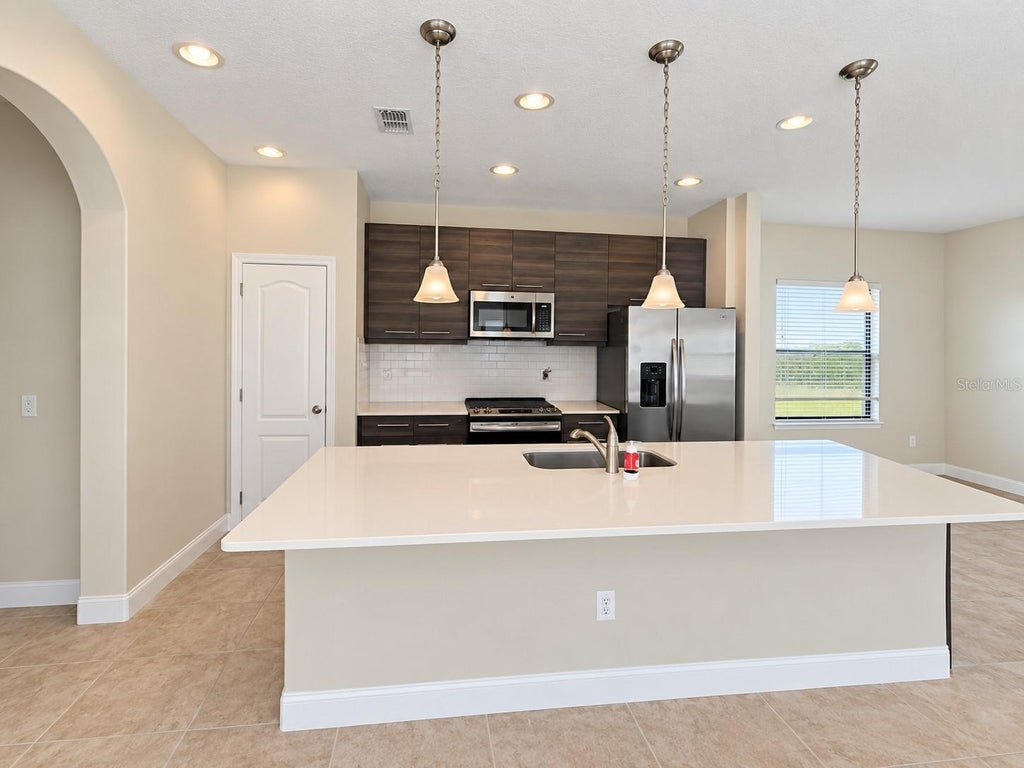 Photo of 196 Kenny Boulevard, Haines City, FL 33844 (MLS # S5158342)