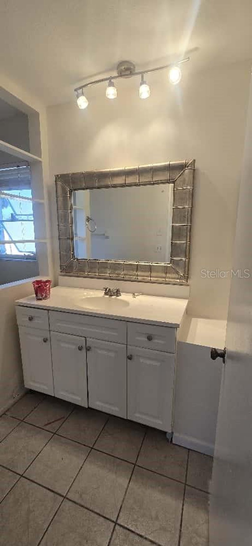 Photo of 401 Skylark Lane NW, Port Charlotte, FL 33952 (MLS # TB8442903)