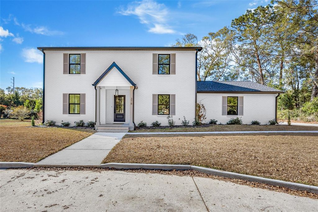 Photo of 378 NW Clubview Circle, Lake City, FL 32055 (MLS # GC536383)