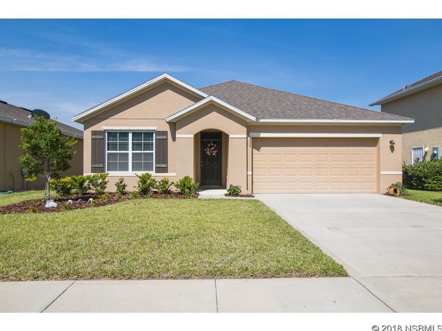 Why not retire in Florida? Just like new home in desirable Edgewater Lakes with open concept floor plan and large island great for entertaining. Close to shopping, restaurants, and beach, but very quiet community with quiet neighbors makes this the perfect home.  Fresh paint, new appliances, ceiling fans, and indoor laundry room with W/D says "maintenance free and move-in ready". Lots of storage space with split bedrooms adds comfort. Master en-suite boasts a walk-in-closet, walk-in-shower, and double sink vanity. Your new home has a dining room too, making it roomy for family gatherings. Nice screened in lanai off dining room to sit and enjoy the serene backyard. Hurricane Shutters included, plus it sits high and dry away from the flood zone giving you peace of mind; safe to enjoy and love! ;Water: City