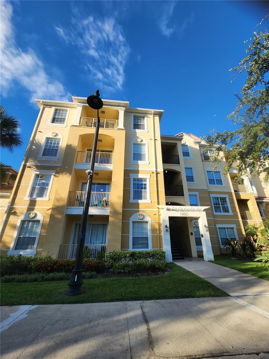 Come and view the one of the best priced units in the very well appointed Vista Cay community, at walking distance from the newly built EPIC universe park!. Experience resort style living right in the middle of Orlando, FL in this furnished 2 bedroom, 2 bath condo (just missing bed linens) with new tile floors and a new main bedroom shower, conveniently located on the 1st level. Located at walking distance from Publix, Walgreens, restaurants, bars and shops. Bask in the tranquil surroundings, or explore the myriad of resort-style amenities at your doorstep. These include a stunning clubhouse, 2 sparkling resort style pools with lake views, a 20-person hot tub, and a pool bar for your leisure. Fitness enthusiasts will revel in the brand new fitness center, equipped with state-of-the-art cardio machines, nautilus machines, and free weights. Sports and recreation are catered for with a full basketball court and a shaded playground. Embrace the beauty of nature with a 2-mile trail encircling the picturesque lake. Located centrally, the condo is minutes away from highways, shopping centers, and attractions. Your HOA includes high-speed internet, cable TV, water, and trash removal services. Indulge in the pinnacle of resort living every day. Welcome to your new sanctuary. Short term rental permitted.
