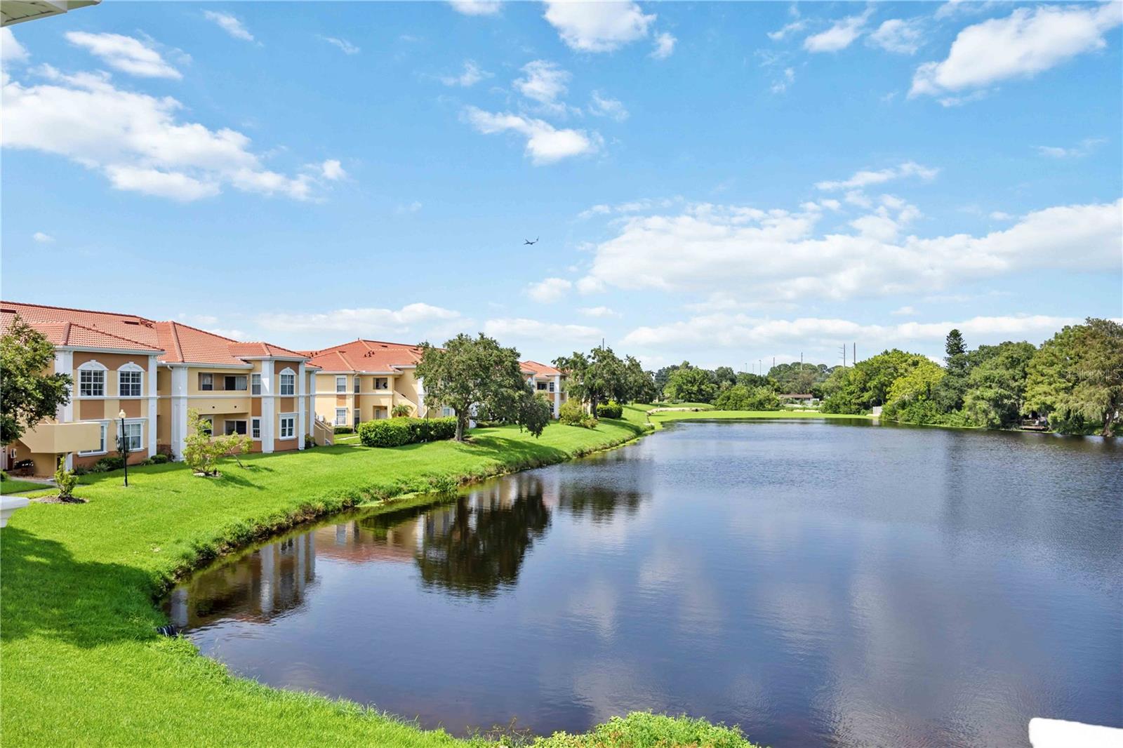 This spacious 1/1 condominium with a beautiful water view will become available September 2nd for annual rent. The 2nd floor unit is located in a serene setting in the back of the building. You’ll like the high tray ceilings in the living and dining combo room. Glass sliding doors lead out to the covered lanai and bring in lots of natural light. The kitchen with breakfast bar offers plenty of storage space. The primary bedroom has a roomy walk-in closet and the bathroom with bathtub has entrances from the bedroom and the living space. A laundry room off the kitchen with washer and dryer and an office/storage nook in the center of the unit will help keeping everything organized. The unit has carpet throughout, except in the kitchen and bathroom. The unit is nestled within the gated Villagio condominium association, minutes away from downtown Sarasota, shopping and the beautiful beaches, with easy access to 301, I75 and public transportation. Community amenities include a heated resort-style pool, tennis court, playground and gym. Rent is $1595 (no utilities included) and move in requirements are first month's rent and a security deposit equal to one month’s rent. The Villagio charges $100.- per adult for the background check. Unfortunately, pets are not allowed, and it is a nonsmoking unit. RoseBay International Realty doesn't manage this unit, we solely help the landlord with securing a new tenant. Reach out today to schedule a showing in person or a virtual tour. There is a tenant in place, please allow a day's notice before showings.