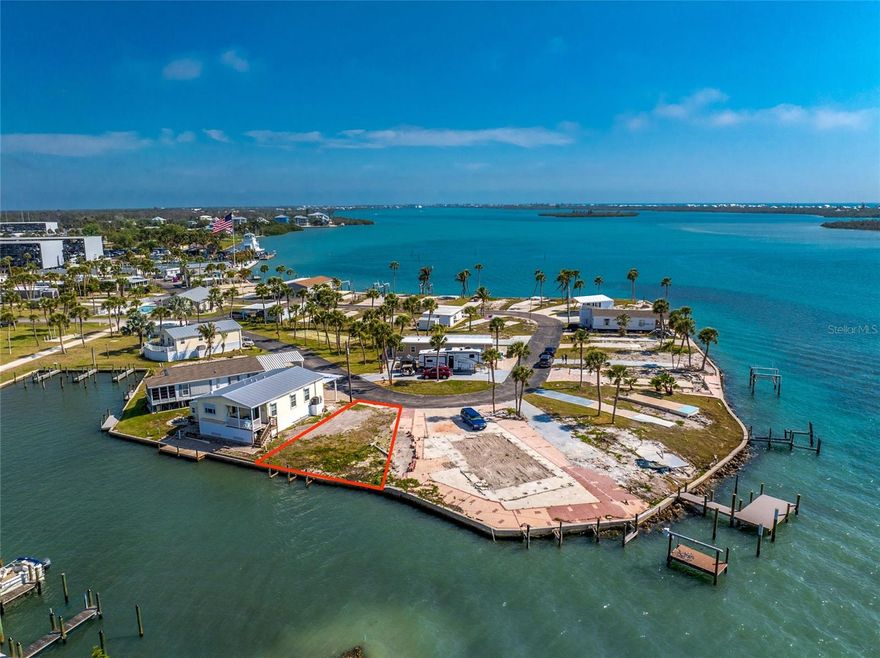 One or more photo(s) has been virtually staged. Dream Big on Lemon Bay! A Beautiful Waterfront Lot Awaits.

Imagine waking up to the gentle sound of the Gulf, just 10 minutes by boat via Stump Pass. This stunning lot on Lemon Bay puts you a kayak’s glide away from barrier islands and pristine Gulf beaches. Plans were in place for a 2-story, 3-bedroom dream home with a deck that opens to the bay. Every step was taken bids from contractors, flood plain studies by a hydro engineer, and a builder ready to secure approval with Charlotte County. Now, life’s twists have opened this rare chance for you.

Picture yourself on your private deck, sipping fine wine as dolphins play, eagles soar, and egrets glide by. The lot is nestled in a secure harbor with brand-new seawalls, a boat launch, and your very own dock for endless water adventures.

Park Pointe is an inviting and friendly cooperative on Lemon Bay, known for its welcoming atmosphere and involved community. Residents enjoy an active Board, engaged neighbors, and as much social life as you choose, making it easy to feel at home whether you prefer quiet coastal living or community gatherings.

Park Pointe offers a wealth of amenities—a sparkling pool, whirlpool, and roomy clubhouse. Park Pointe is a 54-unit co-op in which you own one share of stock valued at 1/54 of the market value of the Park’s assets.

Located close to world-famous Tarpon fishing in Boca Grande, beautiful beaches, shopping, and dining.

Don’t just dream it—make it yours.
