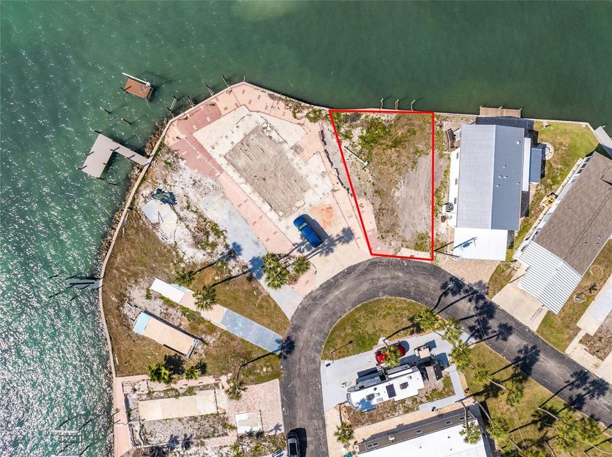 Dream Big on Lemon Bay! A Beautiful Waterfront Lot Awaits.

Imagine waking up to the gentle sound of the Gulf, just 10 minutes by boat via Stump Pass. This stunning lot on Lemon Bay puts you a kayak’s glide away from barrier islands and pristine Gulf beaches. Plans were in place for a 2-story, 3-bedroom dream home with a deck that opens to the bay. Every step was taken bids from contractors, flood plain studies by a hydro engineer, and a builder ready to secure approval with Charlotte County. Now, life’s twists have opened this rare chance for you.

Picture yourself on your private deck, sipping fine wine as dolphins play, eagles soar, and egrets glide by. The lot is nestled in a secure harbor with brand-new seawalls, a boat launch, and your very own dock for endless water adventures.

Park Pointe is an inviting and friendly cooperative on Lemon Bay, known for its welcoming atmosphere and involved community. Residents enjoy an active Board, engaged neighbors, and as much social life as you choose, making it easy to feel at home whether you prefer quiet coastal living or community gatherings.

Park Pointe offers a wealth of amenities—a sparkling pool, whirlpool, and roomy clubhouse. Park Pointe is a 54-unit co-op in which you own one share of stock valued at 1/54 of the market value of the Park’s assets.

Located close to world-famous Tarpon fishing in Boca Grande, beautiful beaches, shopping, and dining.

Don’t just dream it—make it yours.