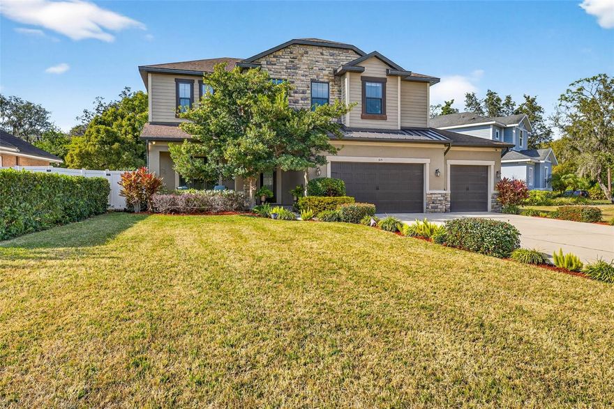 Welcome to this beautiful, energy-efficient five-bedroom, 3.5-bath home perfectly positioned with views of the 7th fairway of the Temple Terrace Golf & Country Club. The exterior showcases durable Hardie® board siding complemented by a custom cultured stone façade and decorative metal roof, offering both timeless curb appeal and low-maintenance living.

Inside, the thoughtfully designed first floor features a private home office and a spacious primary suite highlighted by tray ceilings and high-end finishes. The main living area includes a formal dining room, indoor laundry, a convenient half bath, and an expansive chef’s kitchen that opens seamlessly to the family room with striking custom wood beams.

The kitchen is designed for both everyday living and entertaining, offering high-end stainless steel appliances, a gas range, GE Café refrigerator, floor-to-ceiling pantry, oversized granite island, and a generous eat-in space overlooking the backyard.

Double French doors lead to the covered back patio, where you can relax and enjoy a lush tropical garden. The landscape features an impressive variety of plants and fruit trees, including pink tabebuia, azaleas, gardenias, Concord grape and passionfruit vines, blackberries, Barbados cherry, avocado, dragon fruit, papaya, banana, and strawberry guava.

Interior upgrades include a new whole house water softener and filtration system spray-foam insulation, double-pane energy-efficient windows, tankless gas water heaters, solid wood cabinetry, granite countertops, 5-inch baseboards, custom wood beams, and French doors with built-in blinds. Porcelain flooring throughout the first floor adds durability and style.

Additional exterior features include pavered front and back porches, dual-zone HVAC systems, a seven-zone irrigation system with a separate irrigation meter, and unmatched views of the historic Temple Terrace Golf Course’s 7th fairway.


Homeowners and their guests can enjoy an optional membership to the nearby Temple Terrace Family Recreation Complex, which offers multiple pools, basketball, tennis, pickleball courts, youth and senior programs, and much more. New homeowners are eligible to receive a complimentary three-month social membership to the Temple Terrace Golf and Country Club. 

Conveniently located just minutes from major highways, 25 minutes to Tampa International Airport and downtown, and 10 minutes to many of the area’s top medical facilities, including USF and Moffitt Cancer Center. Don’t miss the opportunity to live in the active, social, and golf-cart-friendly community of Temple Terrace, voted Best Hometown in 2024