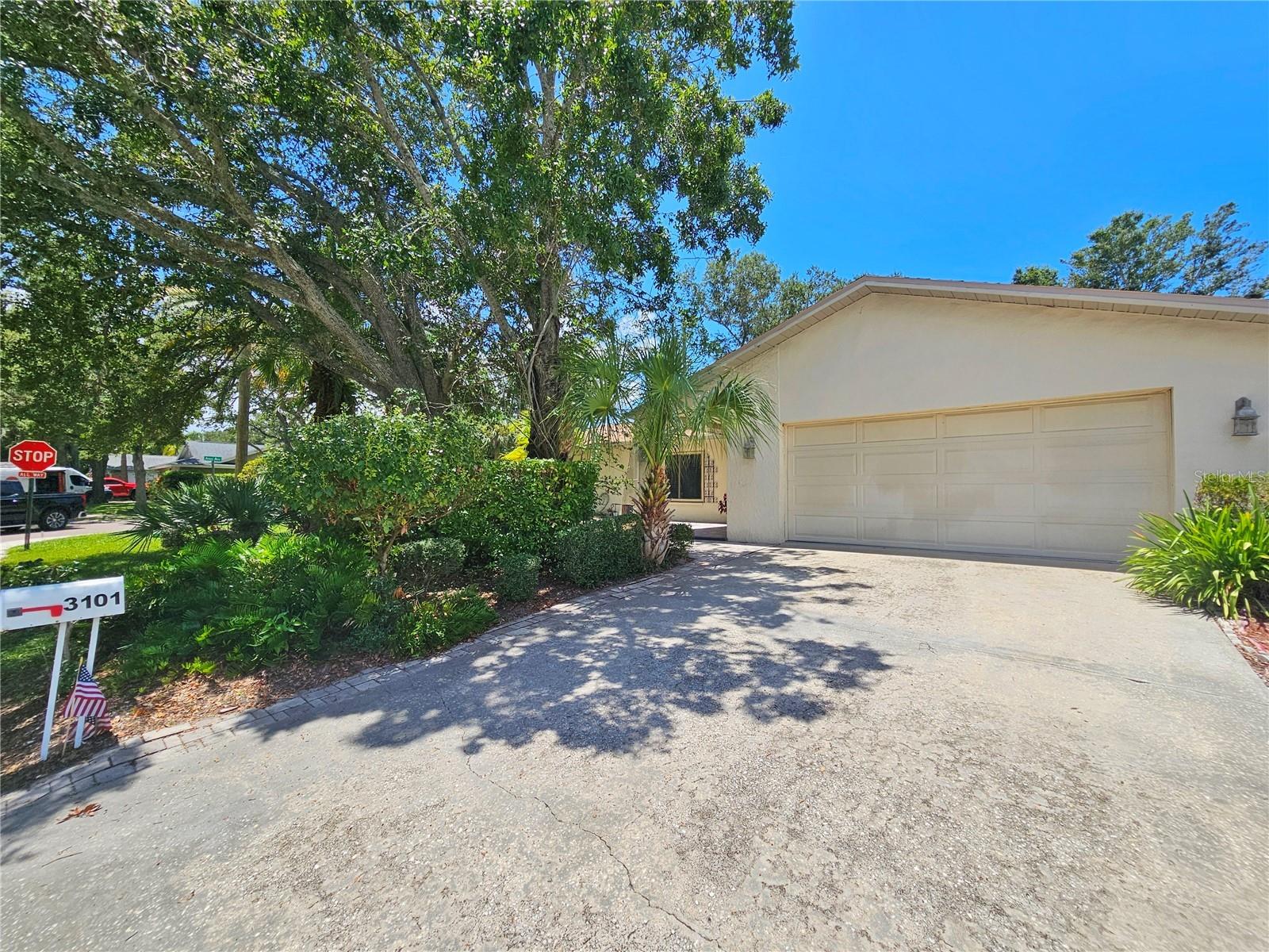 Welcome to Safety Harbor! This charming 3-bedroom, 2-bathroom block home is located in a lovely residential neighborhood and boasts over 1,600 square feet of living space, along with ample outdoor entertainment areas. The home features brand new impact windows and a new roof! As you enter, you'll find a foyer adjacent to the garage and laundry room. The layout offers two potential living areas separated by the kitchen, which is conveniently located at the center of the home. Two good-sized bedrooms are situated on the east side, while the main bedroom is located on the west side. You'll enjoy three sliding glass doors leading to a spacious screened patio, complete with additional paved outdoor space, making it ideal for entertainment and leisure. There’s also a double swing gate for private recreational vehicle parking or storage, in addition to the 2-car garage. Don’t miss this opportunity—book your showing today! Pets are negotiable, and lawn service and pest control are included in the rent.