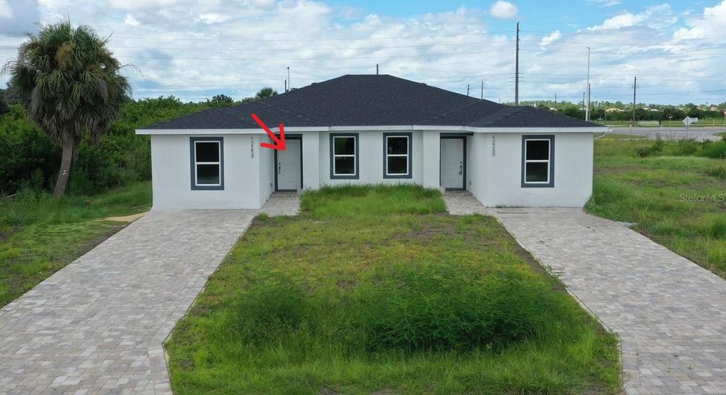 Photo of 12258 Henley Avenue #A, Port Charlotte, FL 33981 (MLS # C7514300)