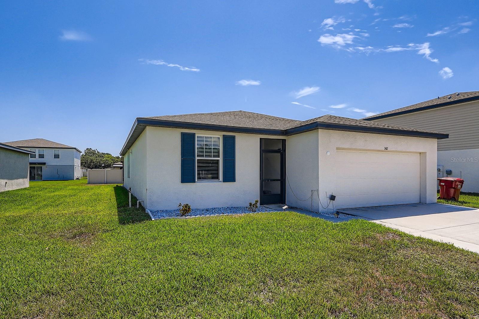 An easy commute to Tampa, TPA, and Lakeland while being in the quiet rural residential area at the center of the World Famous Strawberry Festival, this is Plant City! This recently built Meritage home offers upgraded tile flooring throughout the home - no carpeting, and upgraded black-out blinds. The kitchen boasts beautiful granite countertops, dark wood 42" upper cabinets with ample lower cabinets, a walk-in pantry and whirlpool appliances. The split bedroom floorplan offers maximum privacy for residents. In addition to the three bedrooms, the den/flex room offers options for an office, a man cave or other special use area. This home allows one to take advantage of the Florida lifestyle with a full house length screened lanai.