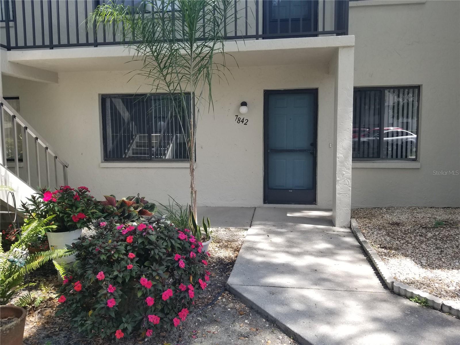 NOW AVAILABLE ANNUAL UNFURNISHED EXECUTIVE RENTAL. Renovated GROUND floor condo in a quiet and private building. For LEASE in the Palm Aire Country Club community of Eagle Creek with fantastic nature and preserve views. This condo features a NEW KITCHEN with granite counter tops, white cabinets, pantry storage and stainless steel appliances. The main suite features a walk in closet, a hall closet and a NEW EN SUITE BATHROOM with new dual sinks, tile and fixtures. NEW PAINT, FLOORS AND FINISHES throughout. LAUNDRY IN UNIT!! Relax on the large tiled and screened lanai with a ceiling fan looking over green lawn and trees. This Palm Aire Country Club community has a large heated pool with a club room. Optional memberships available at Palm Aire Country Club but not required. Palm Aire features 36 holes of championship golf, tennis, pickleball, fitness, and dinning. This area offers ideal access to the University corridor with shopping, dining, medical services and tons of activities. Downtown and the beaches are a quick drive as well.