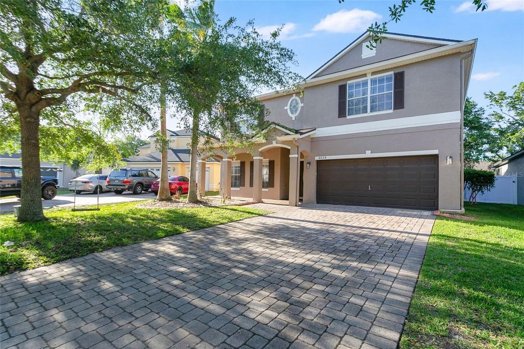 Photo of 4034 Feldspar Trail, Orlando, FL 32826 (MLS # O6397843)