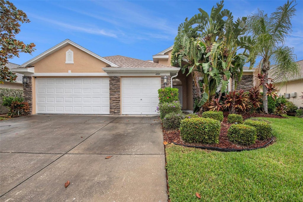 Photo of 4883 W Breeze Circle, Palm Harbor, FL 34683 (MLS # TB8546997)