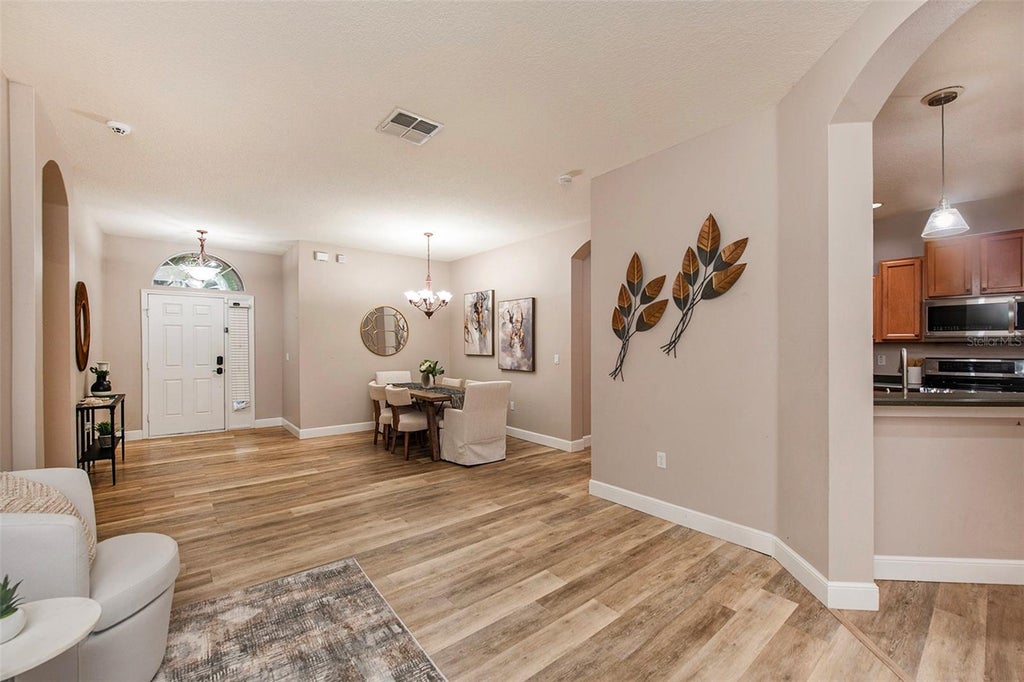 Photo of 4883 W Breeze Circle, Palm Harbor, FL 34683 (MLS # TB8546997)