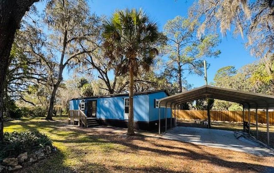 Price Adjustment! Seller and Seller offering 2,500 towards any improvements. Nestled amid the tranquil woodlands of Fort McCoy, Florida, this inviting 2 master bedroom residence offers the perfect blend of rural charm and modern convenience. Surrounded by the natural beauty of the Ocala National Forest and just a short drive to the Ocklawaha river and lake Kerr other local lakes, recreation aras and boat ramps, this property is an oasis for those seeking peace, privacy, and a connection to nature.
Interior Features
Open-concept living and dining areas with large windows that fill the space with sunlight and frame picturesque views
 kitchen equipped with appliances and generous custom resin counter space.
2 Master suites featuring a walk-in closet and a private bathroom, 1with a soaking tub and 1 with a shower
Programmable Central air conditioning and ceiling fan to keep your home comfortable year-round
Freshly painted interior and cabinets
Exterior Features
New Roof installed 2024
 Hurricane impact windows installed 2024
New drain field installed 2025
Privacy fence on rear half of the property
Motion sensor security lighting
Digital resettable keyless entry locks, brink your own keys
Expansive fenced in, zoned A1 property with mature trees, perfect for gardening, outdoor gatherings, raising animals or simply enjoying the quiet countryside
Covered 2 car carport,
Front deck ideal for sipping morning coffee or relaxing at sunset
Fire pit with bench seating 
Detached workshop providing extra storage space and room for hobbies
Private driveway with ample parking for vehicles, boats, or RVs
Access to local boat ramps and nearby lakes for fishing and water activities
Location Highlights
Close proximity to the Ocala National Forest, Silver Springs, and many outdoor recreation options
Local community center with entertainment,
Walk to local stores and a short drive to restaurants, and essential services in nearby Silver Springs, Ocala and Gainesville
Peaceful neighborhood with a welcoming community atmosphere
Ideal setting for year-round living, a seasonal getaway, or an investment property
Additional Information
This Fort McCoy home is move-in ready and provides a rare opportunity to embrace the Florida lifestyle in a setting defined by natural splendor and comfort. Whether you're longing for a serene retreat or a place to make lasting memories, this property is waiting to welcome you home. Please note CASH only buyers.