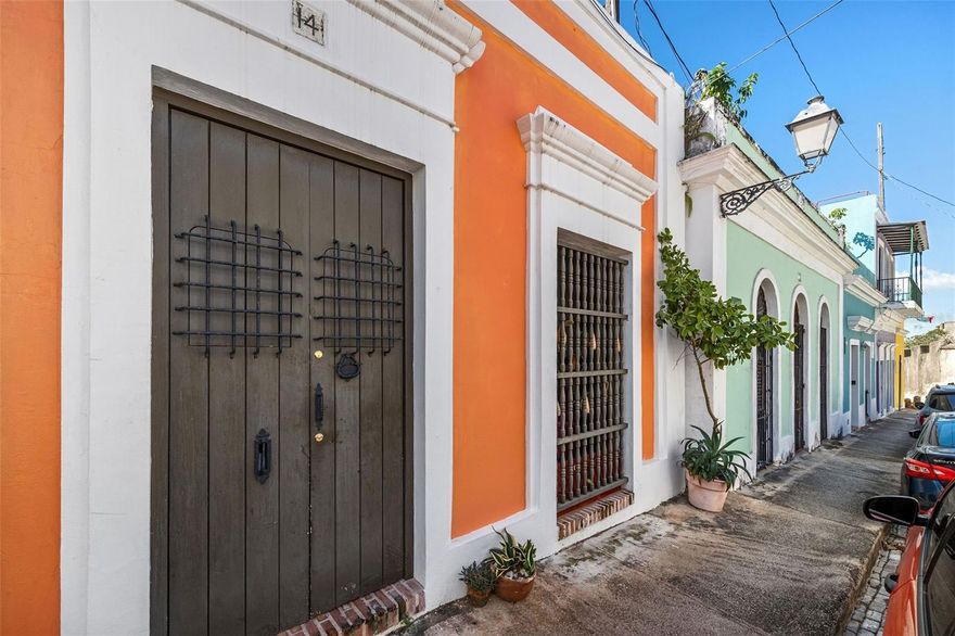 OLD SAN JUAN, step back in time and immerse yourself in the rich history and culture of Old San Juan, with this stunning colonial house for sale! This beautiful property, built in the late 1780s, has been carefully restored and preserved to retain its original charm and character. Located in the heart of the old city, this property offers the perfect blend of old-world charm and modern convenience.
The house is a three-level home, having 3,500 square feet, featuring three bedrooms, three bathrooms, powder room, two living areas, dining, kitchen, family, office room, storage, patio, two terrace spaces at the second level and roof terrace. The lot has an area of 151 square meters. As you enter, you'll be greeted by a grand foyer that leads to a spacious living room with high ceilings and traditional Spanish marble tile floors. As you step into the zaguan of this stunning colonial home, you'll feel like you're being transported back in time to a bygone era of grandeur and elegance. The zaguan, with its soaring arches serves as a dramatic entryway, leading you from the bustling street outside to the serene and private living area within. Making your way through the zaguan, you'll notice the intricate details and craftsmanship that are hallmarks of colonial architecture. The tiled floors, meticulously laid by skilled artisans, create a sense of flow and continuity, leading you deeper into the heart of the home. The high ceilings, adorned with decorative moldings and carvings, lend a sense of greatness and importance to the space. The formal dining room is perfect for hosting dinner parties, with plenty of space for family and friends to gather around the table. The fully equipped kitchen has been updated with modern appliances, while still retaining the traditional style of the home. The second level has three spacious bedrooms, each with its own unique character and charm, and full bathrooms in addition to two terrace spaces at each end of this level. Gazing upon the historical masonry wall located in the lower level of the patio area, you will be mesmerized by the texture and color of the wall, along with the elaborate patterns of the bricks, telling the story of colonial times and cultural heritage. The warm sun and gentle breeze from the mango tree add to the peaceful ambiance, allowing you to fully appreciate the beauty of the architecture and the natural surroundings. Step outside to the expansive rooftop terrace, where you can enjoy stunning views of the city and the ocean beyond. The terrace is the perfect place to relax and unwind, with ample space for outdoor dining and entertainment. Located at the most desirable area of Sol Street, in the heart of Old San Juan, this property is just steps away from world-class restaurants, boutique shops, and historical landmarks. Whether you're looking for a vacation home or a permanent residence, this colonial house offers the perfect opportunity to immerse yourself in the vibrant culture and rich history of Puerto Rico. Don't miss this once-in-a-lifetime opportunity to own a piece of history in Old San Juan, one of the most sought-after neighborhoods in Puerto Rico. This property has been granted tax exemption from property taxes and tax exemption from rental income. Contact us today to schedule a showing and experience the magic of this stunning colonial house for yourself!