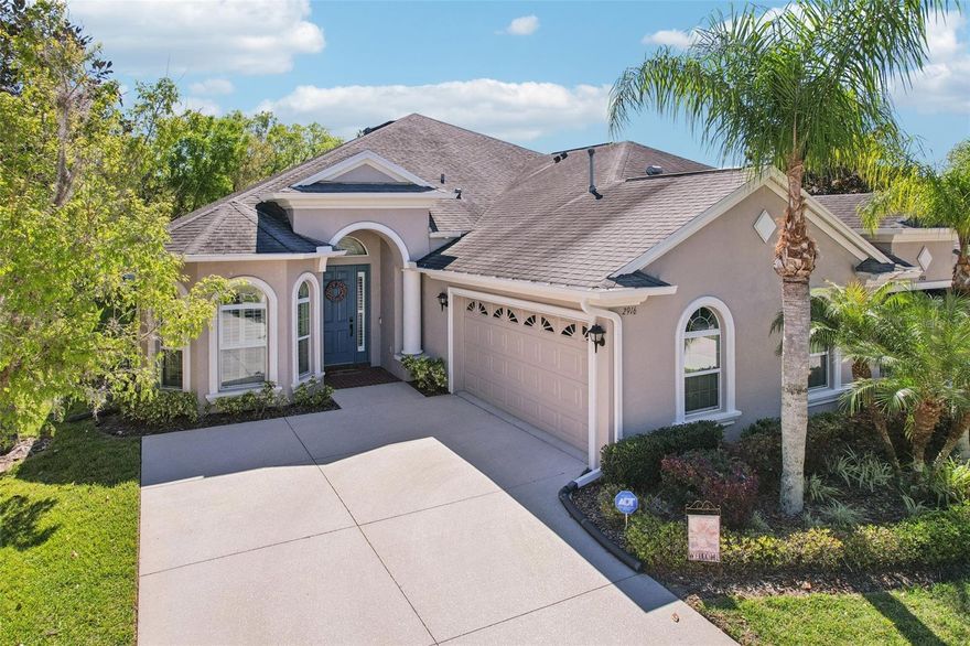 Located in a QUIET, TUCKED-AWAY GATED COMMUNITY in Land O’ Lakes, this exceptionally maintained villa offers a comfortable, low-maintenance lifestyle on a peaceful cul-de-sac street with NO CDD FEES.
Inside, the home features an OPEN FLOOR PLAN WITH HARD FLOORING THROUGHOUT, a light and bright feel, and a neutral color palette that works with any style. Architectural details like arched windows and doorways, tray ceilings, and 5¼” baseboards add subtle character without overwhelming the space. The split-bedroom layout provides privacy, and the home includes 3 bedrooms plus a DEDICATED OFFICE WITH GLASS BARN DOORS AND BUILT-IN CABINETRY—perfect for working from home.
The kitchen is truly a stand-out and is designed for both everyday use and entertaining, with a MASSIVE ISLAND THAT SEATS SIX, WHITE AND GLASS CABINETRY WITH CROWN MOLDING, A SUBWAY TILE BACKSPLASH, STAINLESS STEEL APPLIANCES, AND TONS OF COUNTER SPACE AND STORAGE. Recessed and pendant lighting complete the space.
The primary suite offers HIS & HERS WALK-IN CLOSETS and an en suite bathroom with dual sinks and a walk-in shower with frameless glass. PLANTATION SHUTTERS are installed throughout the home for added style and function.
Out back, enjoy an EXTENDED, SCREENED-IN PAVER LANAI overlooking a spacious yard—ideal for relaxing or hosting guests. The HOA provides added value and convenience by covering the roof, exterior painting, and landscaping/lawn maintenance, making for truly easy living. Cable TV and Internet are also covered by the hOA. Additional features include a side-entry garage and access to community amenities like a pool, green space, and a covered picnic area.
This home combines thoughtful design, practical features, and a quiet location for easy Florida living.