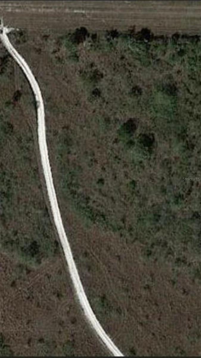 1.25 ACRES HIGH AND DRY VACANT LAND FOR SALE IN OKEECHOBEE COUNTY, FLORIDA. LAND PERPENDICULAR TO ML# O6315531.