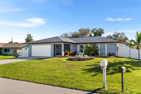 Photo of 3260 Elkcam Boulevard, Port Charlotte, FL 33952 (MLS # C7523043)