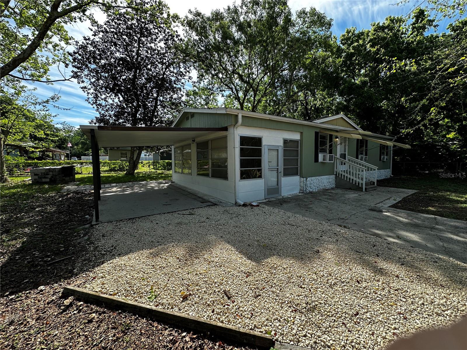 WOW! Major price reduction - the owner says sell now! Make an offer we are ready to work with a buyer. This is a recently painted home in good condition in a country setting yet near everything. It is only 10-15 minutes from the villages - at this price it won't last - call for private showing. Make an offer the seller is motivated. THIS HOME HAS A LOT OF UPSIDE.