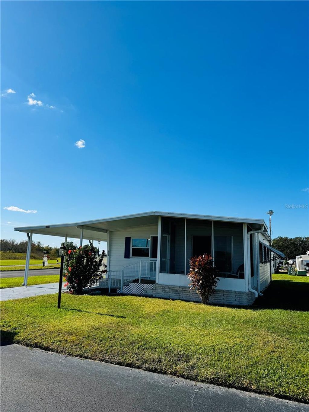 Photo of 320 Aloha Drive, Haines City, FL 33844 (MLS # O6370687)