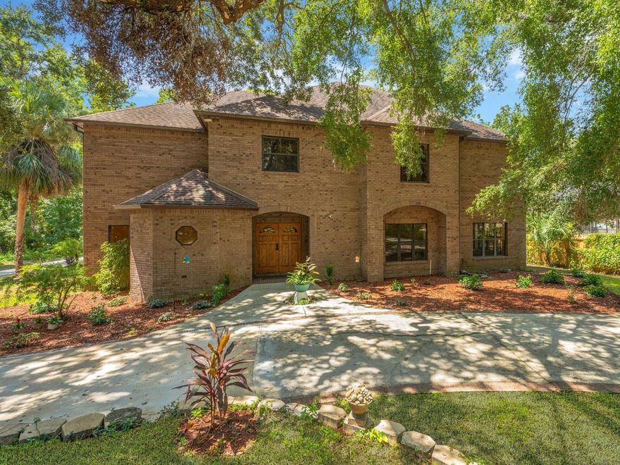 One or more photo(s) has been virtually staged. What are you waiting for? This is NOT your average cookie-cutter home and features 4 + garage ( 1000 + sq ft) with a mechanic's pit, Newer AC's (2022), roof ( 2013) , and a walking trail back to the Alafia River.
4 bedrooms, 3 full and 2 half baths, Indoor Pool/Spa, Elevator, 2 Fireplaces, Wet Bar, and Gated Circular Driveway nestled at the end of a quiet cul-de-sac on over an acre with 138 feet of Alafia River frontage, a Private Dock, and Riverside Deck.
From the moment you step through the solid oak double doors into the two-story marble foyer, you're enveloped in rich craftsmanship and architecture. Intricate solid oak detailing, 9’ Ceilings, 5.5” Baseboards and luxury finishes greet you at every turn.
The living room offers tranquil views of the manicured, gated entry—framed by grand windows that flood the space with natural light. Across the foyer, the dining room is adorned with a custom-built oak china cabinet, perfect for hosting intimate dinners. Steps away is the heart of the home, a chef’s dream kitchen, equipped with a Sub-Zero refrigerator and freezer, induction cooktop with anti-scratch matte glass, granite countertops, a center island, walk-in pantry, and a spacious eat-in area.  The kitchen was thoughtfully designed to inspire culinary creativity and seamless entertaining.
The family room is equally impressive, featuring a cozy wood burning fireplace,  custom-built oak shelves and cabinetry, a wet bar with ice maker, sink, frig, built-in blender and a surround sound system to set the tone for relaxation. Two 3-panel sliding glass pocket doors vanish to reveal the stunning enclosed Atrium with (15x30) Indoor Pool & Spa—both heated by solar.  This indoor oasis is set under a two-story vaulted ceiling with skylights and includes a DCS outdoor kitchen, complete with gas grill, Thermador hood, refrigerator, and sink and access to a full bathroom making this area ideal for year-round entertaining.
Ascend by elevator or stair to the spacious owner’s suite, a 17x20 retreat with dual cedar-lined walk-in closets and a European spa-style bath, featuring dual vanities with sinks and a central walk-in shower, toilet, urinal & bidet.
Adjoining the suite is a spacious flex room with its own fireplace—ideal as a private lounge, nursery, or 4th bedroom. Glass doors lead to a balcony overlooking the pool/spa atrium below.
A second bedroom suite includes dual built-in closets, a private en-suite bath with dual vanities with sinks, and a step-in shower.
Remote workers and Book lovers alike will appreciate the 30x14 oak-lined library or home office, featuring wall-to-wall built-ins, custom cabinetry and desk—a warm, inviting space for work or relaxation.
An upstairs laundry room with utility sink and a fourth bedroom or versatile flex room round out the second floor.
, Modern Light Fixtures & Granite Countertops, Updated Pool Pump & Upgraded Water Heaters(2)
Meander down a winding pathway that leads you to the tranquil riverfront, where you can enjoy peaceful mornings or canoe/kayak/paddleboard from your private dock or simply sit and enjoy the quiet sounds of nature.
Don’t miss this once-in-a-lifetime opportunity to own a secluded riverfront residence with every imaginable amenity, designed for those who demand the very best in life.
Schedule your private tour today.