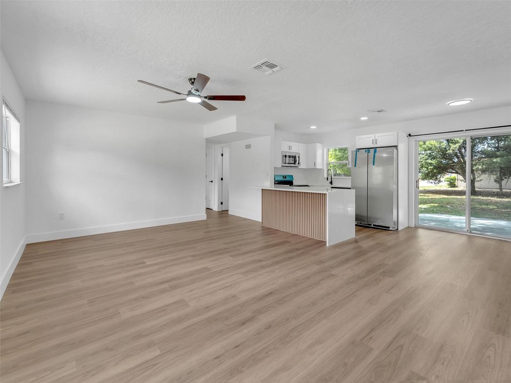 Photo of 900 Jamela Drive, Ocoee, FL 34761 (MLS # O6402989)